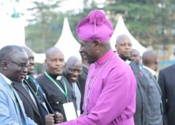Archbishop Kaziimba Mugalu with some of  the clergy at the retreat