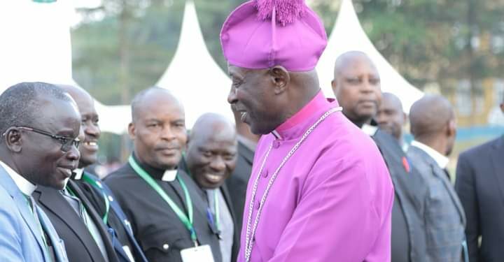 Archbishop Kaziimba Mugalu with some of  the clergy at the retreat