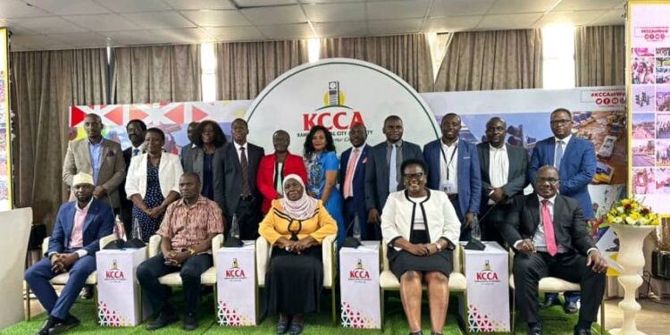 KCCA top figure heads, Ministers and CSOs leaders pose for a photo during the Inaugural Annual KCCA NGO symposium. June 30th, 2023. (Photo@KCCA)