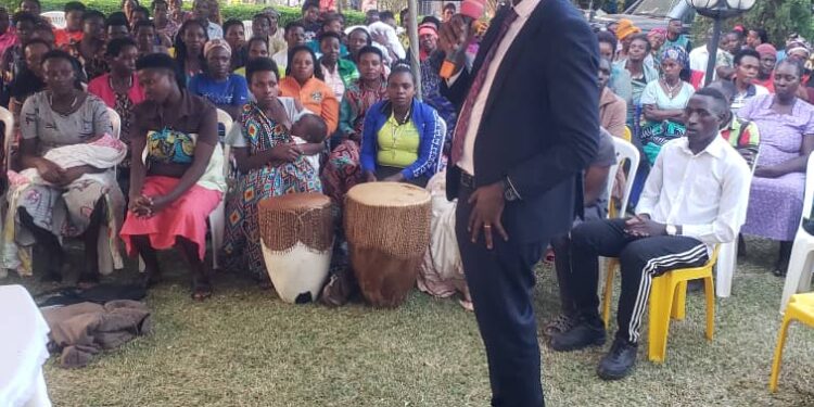 Nshangabasheija Nelson speaking to mourners at the late Apollo Nyegamehe's home on Monday evening