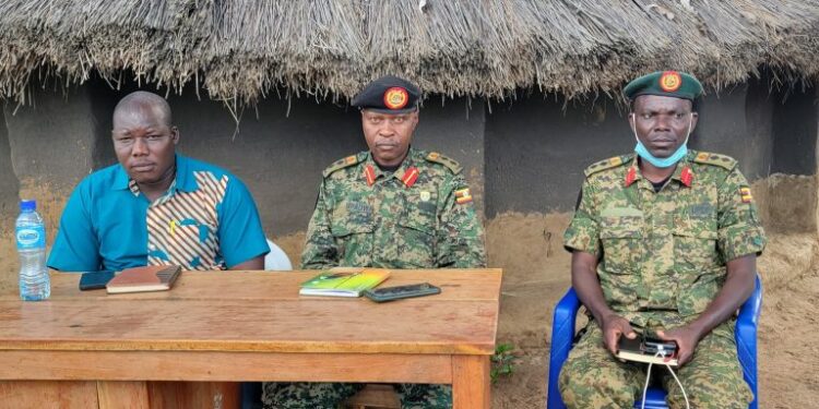 Col Gai Mpadwa 5 Infantry Division second in command and LC3 Chairman Parabongo Sub-county Mr. Stephen Ochan briefing the media about the suspects