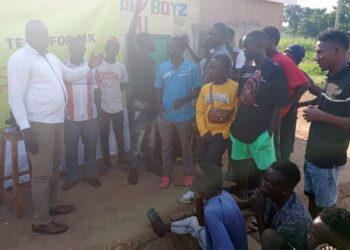 RCC Benesa(left) with Ghetto members in Swahili camp, Soroti East Division