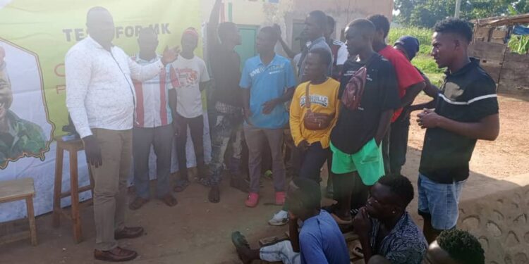 RCC Benesa(left) with Ghetto members in Swahili camp, Soroti East Division