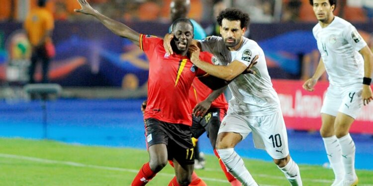 Uganda Cranes' Farouk Miya facing off with Egypt's Salah