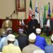 President Sayyid Ebrahim Raisolsadati of Iran (seated C) addresing the Muslim community during prayers at Old Kampala Mosque on Wednesday. Seated (L) is Mufti Shaban Mubajje. PPU Photo