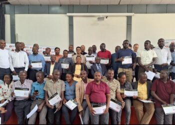 Minister Babalanda in a group photo with the training participants