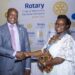 Makerere University Vice Chancellor Prof Barnabas Nawangwe pose for a photo with Associate Professor Consolata Kabonesa after being installed as the president of Rotary Club of Makerere Rainbow over the weekend