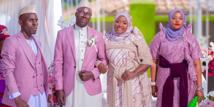 Hajjati Namyalo centre with her hubby Musa Ssentamu during the introduction ceremony in Zana Wakiso