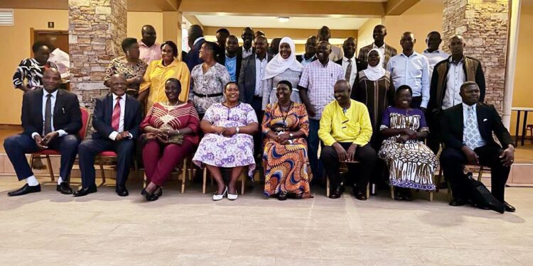 Minister Babalanda, Office of the President officials in a group photo with RDCs,RCCs, RISOs and DISOs from the Elgon Sub-region