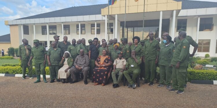 Minister Babalanda with some of the participants of the workshop in a group photo