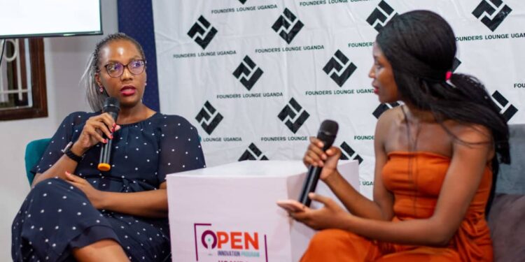 Nataliey Bitature engaging with the session's moderator last Friday evening as she shared her thoughts and experience on how to successfully navigate the tough terrain of the start up world at last Friday's Founders Lounge meet up in Bukoto