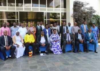 Hajji Yunus Kakande, Hon Amelia Kyambadde in a group photo with RDCs/RCCs/Deputies, RISOs and DISOs in a group photo