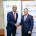 Ashu Gupta, Senior Manager of GX Group-India & Africa (right) shake hands with Roger Sekaziga, the Roke Telkom Chief Executive Officer (left) on the sidelines of the press conference in Kampala. August 17th, 2023. Photo@roketelkom.co.ug