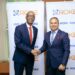 Ashu Gupta, Senior Manager of GX Group-India & Africa (right) shake hands with Roger Sekaziga, the Roke Telkom Chief Executive Officer (left) on the sidelines of the press conference in Kampala. August 17th, 2023. Photo@roketelkom.co.ug