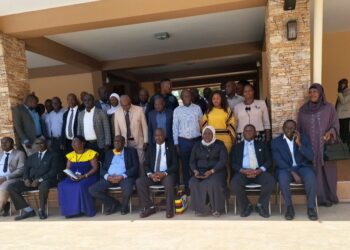 Hajji Kakande, Mr. Kisuyi, Hajjat Malole, officials from the RDC secretariat in a group photo with RDCs/RCCs,  RISO and DISOs