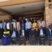 Hajji Kakande, Mr. Kisuyi, Hajjat Malole, officials from the RDC secretariat in a group photo with RDCs/RCCs,  RISO and DISOs