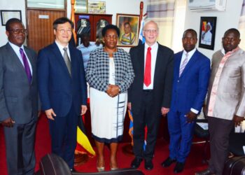 Minister Mutuuzo with Global Peace Festival delegates in her office in Kampala on Tuesday