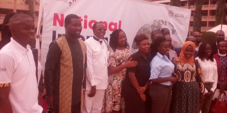 Religious Leaders pose for a group photo at Hotel Africana on Thursday