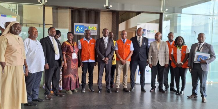 Minister Kyofatogabye, Office of the President officials and NMS officials in a group photo