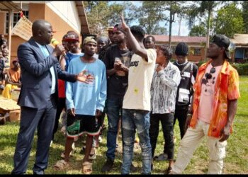 Mr Kirunda with some of the ghetto youth