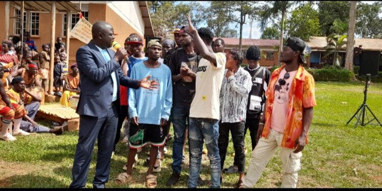 Mr Kirunda with some of the ghetto youth