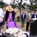 President Museveni and the First Lady laying a wreath on the grave of Canon Kabonero