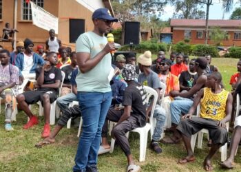 .Maj Emma Kutesa Presidential Assistant Special operations State House during a meeting with ghetto boys at St John SS,Wakitaka,Northern Division,Jinja City.