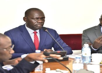 Committee Chairperson, Hon. Gilbert Olanya (C) with his deputy, Hon. Luttamaguzi Semakula as they interacted with the Mpigi officials led by the district chairperson, Martin Ssejjemba