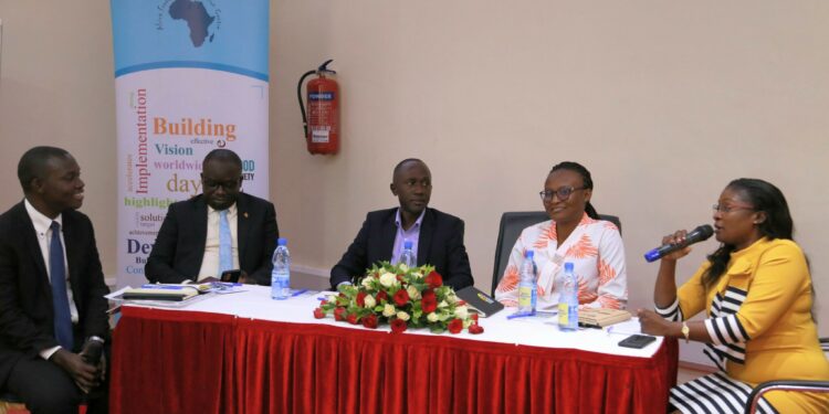 Brenda Namata (2nd right), the Communications and Advocacy Officer for Uganda Media Women's Association (UMWA) with other panelists during the event