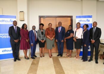 dfcu Bank Management team poses for a picture with the New WBAC members during the Meet & Greet at Golden Tulip Hotel