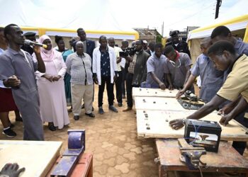 A student of mechanics at the Presidential Initiative on skilling the Girl/Boy Child (PISG/B) demonstrates to a guest on how they have learnt in motor wiring garden at the PISG/B Wabigabo branch in Kampala on 12th September 2023. Photo by PPU/ Tony Rujuta.