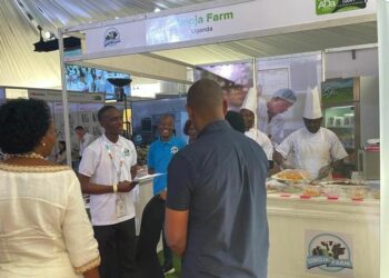 Dairy products exhibitors showcase their products at Kampala Hotel Africana on Tuesday