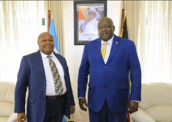 Godfrey Kirumira shares a photo moment with State Minister for Foreign affairs Okello Oryem after presenting his Credentials to him as new Honorary Consul for Namibia to Uganda at the Ministry of Foreign Affairs in Kampala recently