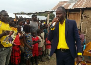 Uthman Mubarak Mugisha addresses supporters at an undislosed location in Hoima district