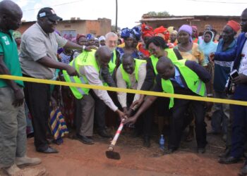 Officials from UNCDF and Yumbe district local leaders launch the Kuru market, in Kuru Town Council, Yumbe