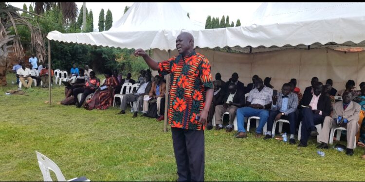 Alex Abura Kawa Lolo addressing participants during a recent meeting of clan chiefs in Lira City.