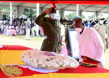 President Museveni paying respect to the body of the late Brig Gen Pierino Okoya