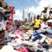 Man selling second hand clothes