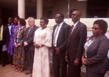 Minister Betty Amongi (Fifth right) is flanked by Ireland Ambassador and other officials during celebrations to mark the International Day for the Girl Child at the National Theatre in Kampala on Thursday