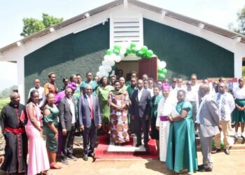 VP Alupo in a group photo with Kigezi High School OBs and OGs,and Bishop Akanjuna