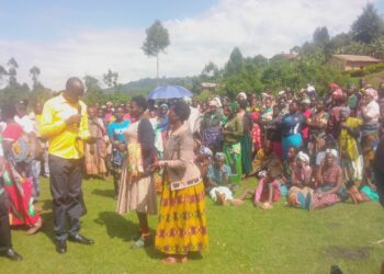 Those who turned up for the hoe distribution program being addressed by the minister Musasizi