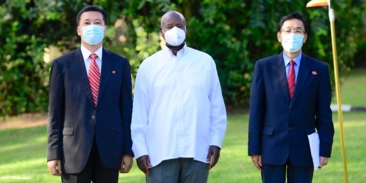President Museveni with the outgoing Ambassador of North korea Jong Tong Hak