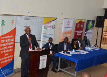 CSBAG Executive Director Julius Mukunda addressing participants at the Renewal Energy Financing at MUBS on Friday