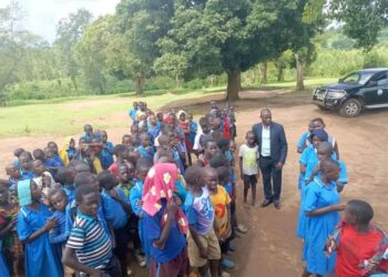 Zzimula with P.7 pupils at Myanzi  primary school