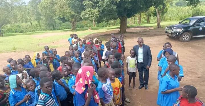 Zzimula with P.7 pupils at Myanzi  primary school