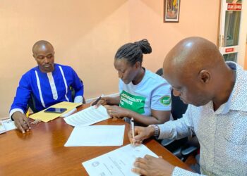 From left: Gad Kwizera (Assist. Agriculture Lecturer, Lira University), Nancy Mugimba (National Coordinator, ESAFF Uganda), and Hakim Baliraine (National Chairperson, ESAFF Uganda) sign an MoU to spearhead agroecology study programs at Lira University.