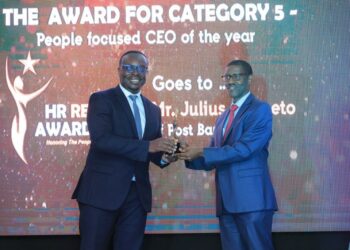 Julius Kakeeto the PostBank Uganda CEO receives the Award for Best People Focused CEO of the year 2023 during the recently concluded HR Reveal Awards at the Kampala Serena Hotel