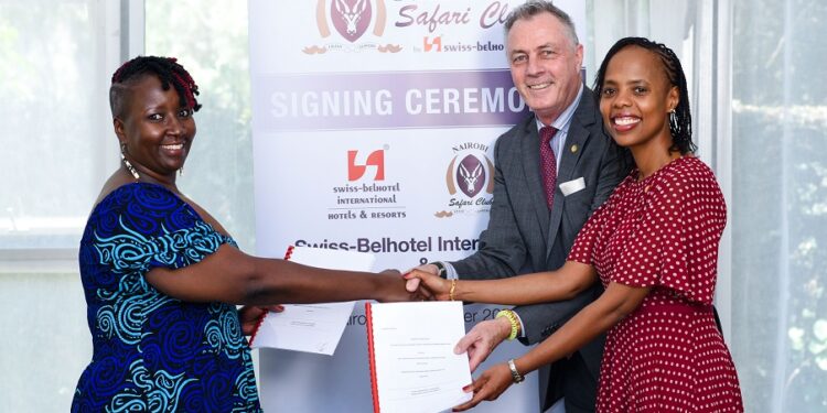 Partnership: Mukawa (Hotels) Holdings Ltd Directors Ms Clare Njeri Githunguri (left) and
Ms Lilian Joy Nyagaki Githunguri (right) exchange the hotel management agreements with
Swiss-Belhotel International’s Senior Vice President Laurent Voivenel (centre) at the signing
of a deal for the management of Nairobi Safari Club by the International hospitality group.
Following the signing, the four-star, all-suite hotel established in 1984 by the late Kenyan
Businessman and Member of Parliament, Honourable Stanley Munga Githunguri, will be
rebranded as Nairobi Safari Club by Swiss-Belhotel.