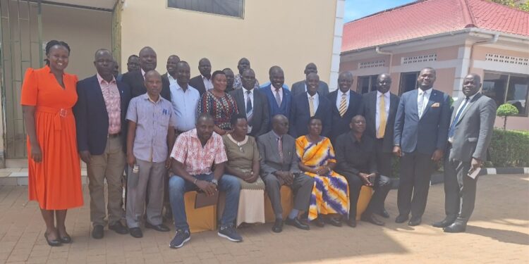 Officials from the Office of the President in a group photo with RDCs,  RISO and DISOs from Karamoja