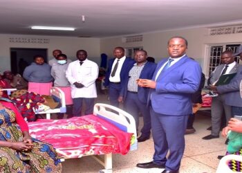 The members of the Committee on Health in one of the wards at Hamurwa Health Centre IV